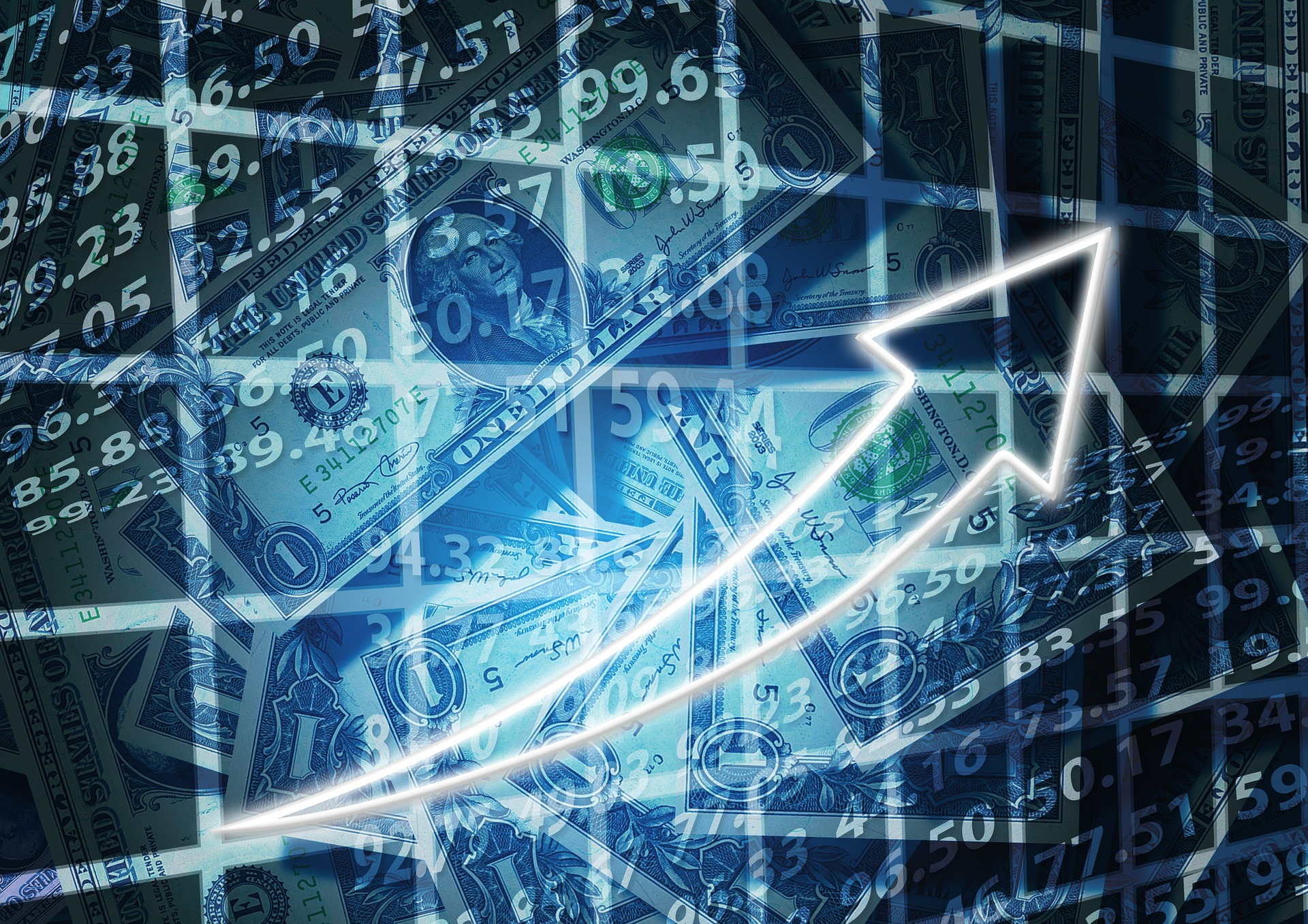 Photo of currency and an upward arrow